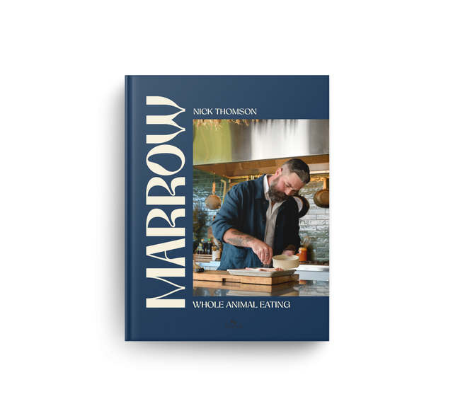 The book 'Marrow: Whole Animal Eating' by Nick Thomason, featuring a dark navy blue cover with a photo of a man cooking on the front, displayed on a clean white background.