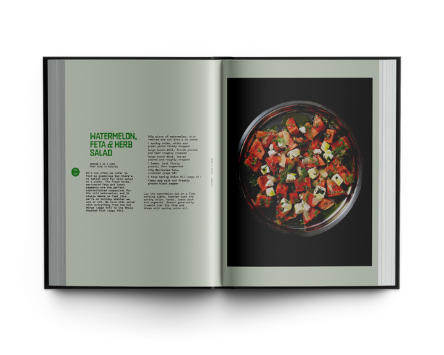 Open cookbook showing a salad recipe with ingredients listed on a white background