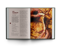 Open book showing a recipe for flatbreads with a close-up of hands holding bread.