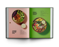 Open cookbook showing two pages with salad bowls and ingredients